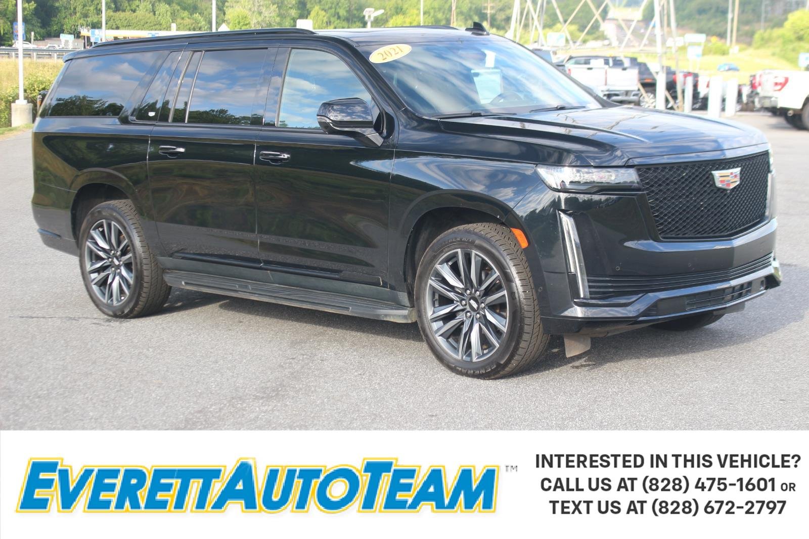 Used 2021 BLACK RAVEN Cadillac Sport Platinum image 1