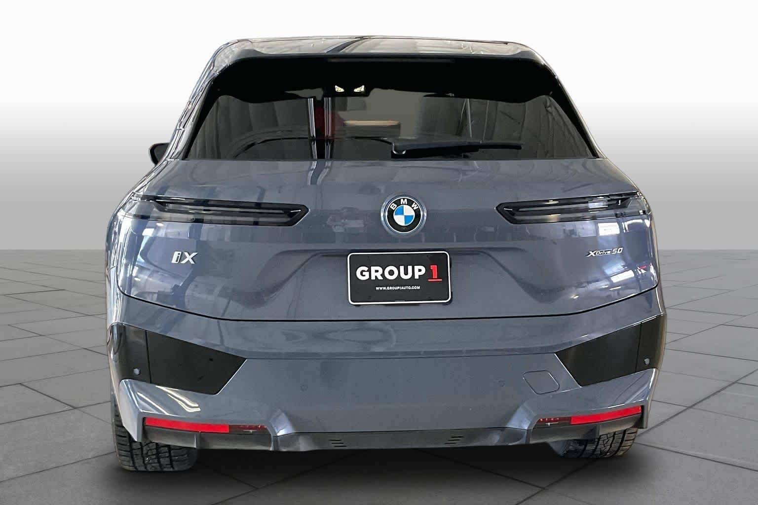 Used 2024 Storm Bay Metallic BMW xDrive50 image 4