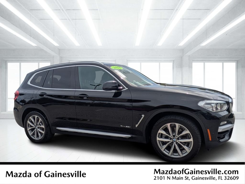 Used 2018 Black BMW xDrive30i image 1
