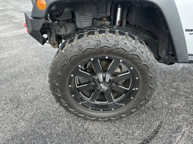 Used 2015 Silver Jeep Unlimited Sport image 21