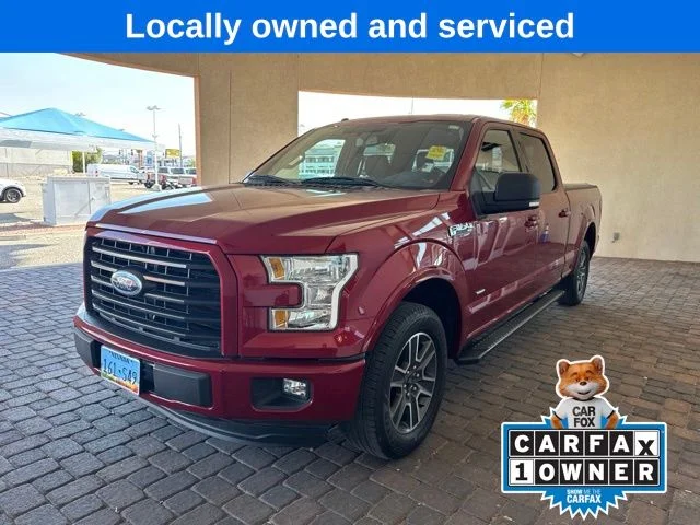 Used 2015 Ruby Red Metallic Ford XLT image 1