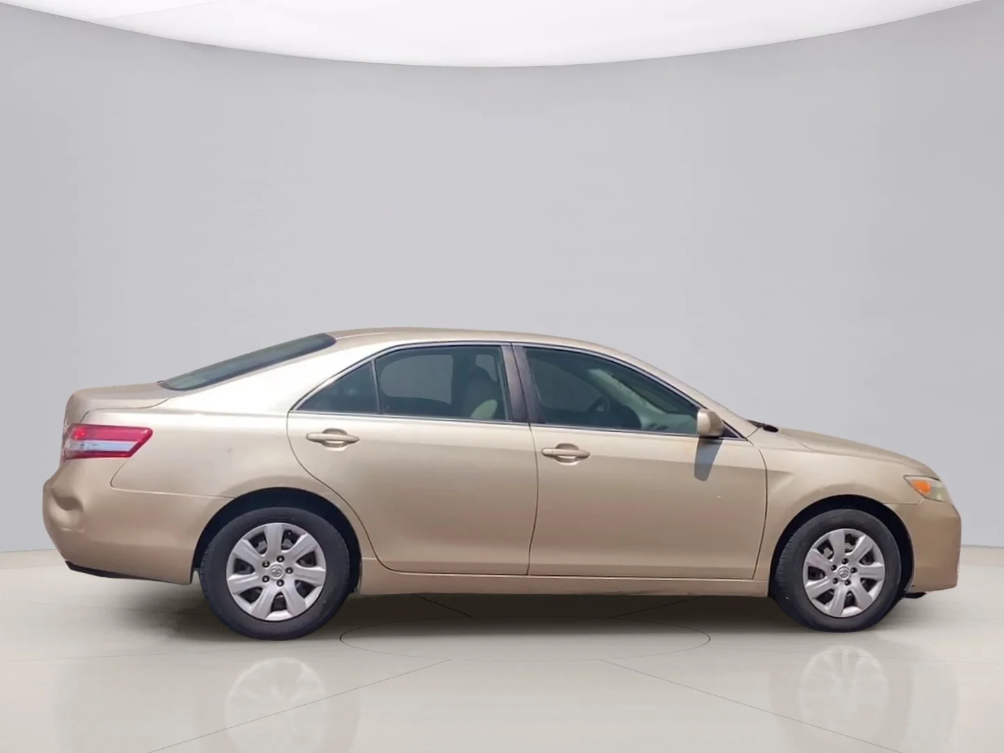 Used 2011 Gold Toyota LE image 6