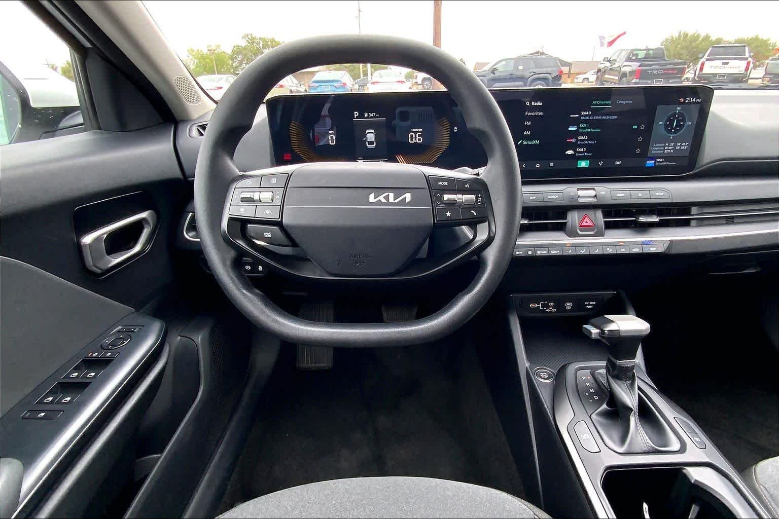 Used 2025 Snow White Pearl Kia LXS image 6