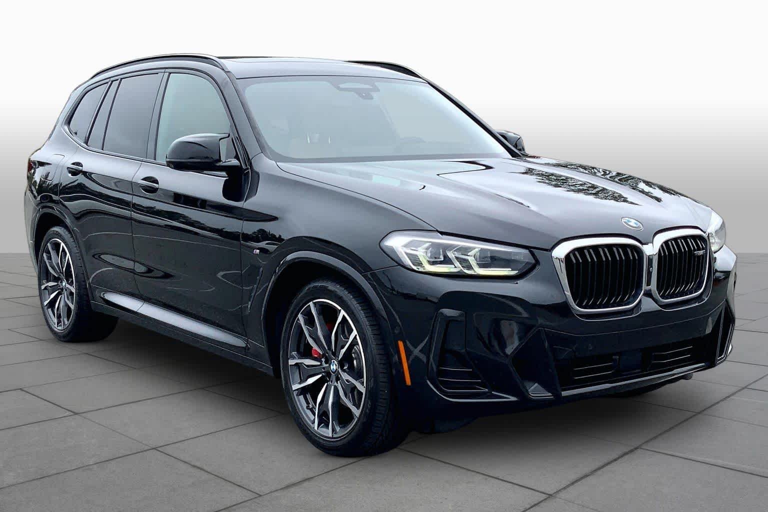 Used 2022 Black Sapphire Metallic BMW M40i image 2