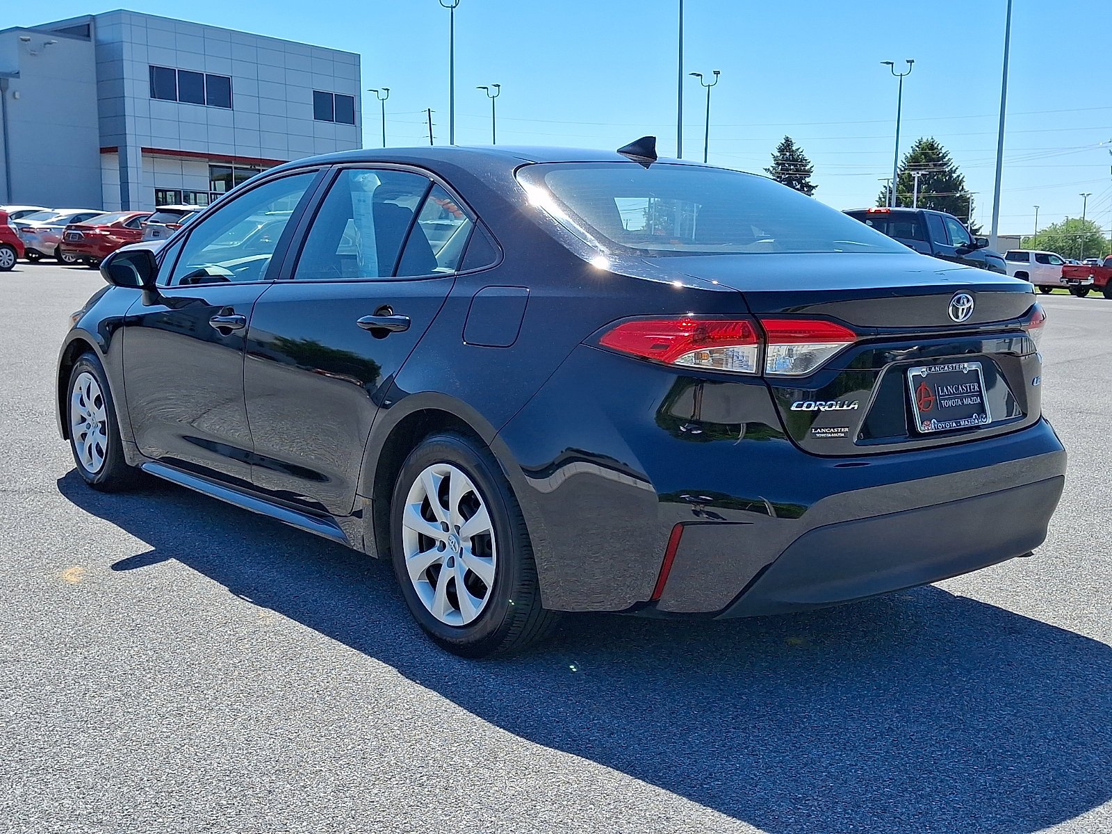 Used 2025 Midnight Black Metallic Toyota LE image 5