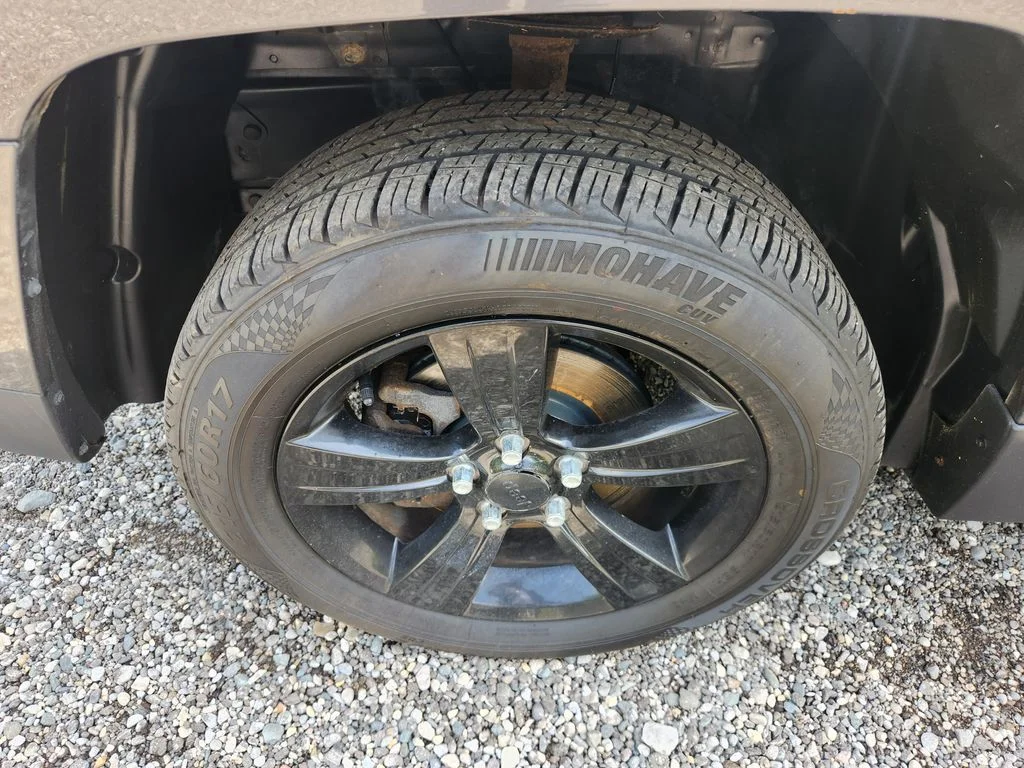 Used 2015 Gray Jeep Sport image 22