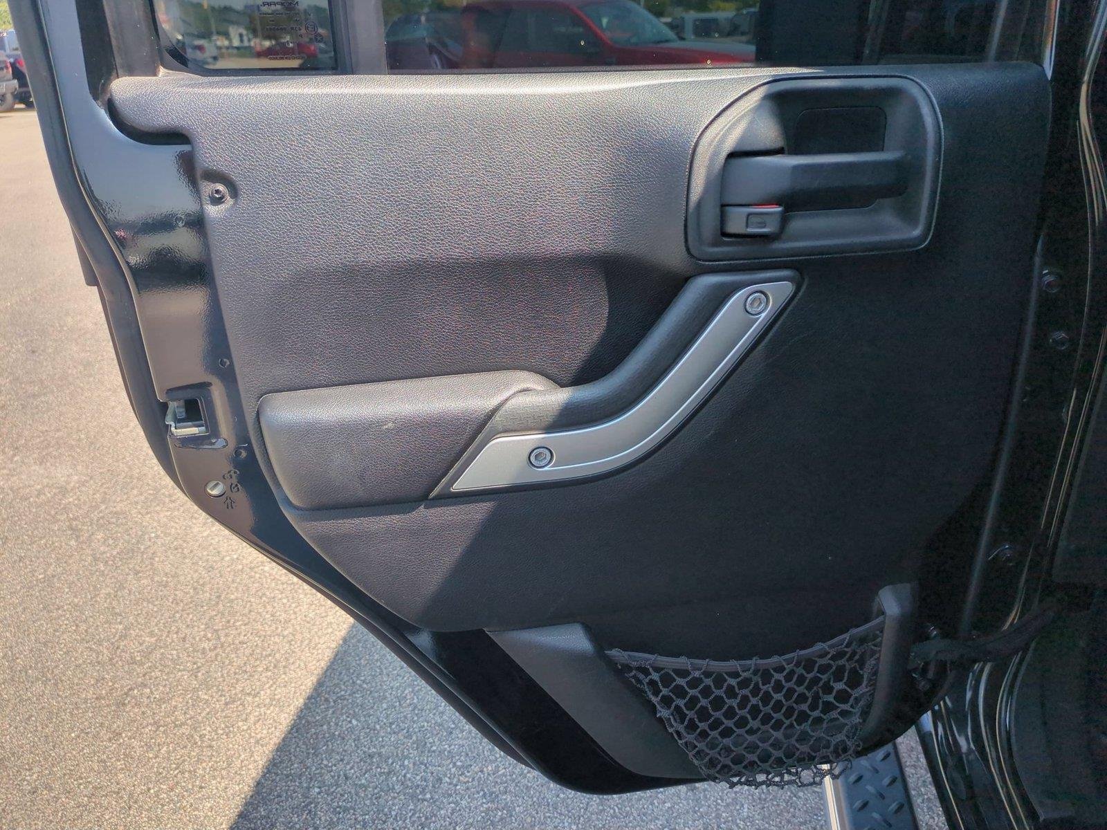 Used 2012 Black Clearcoat Jeep Sahara image 26