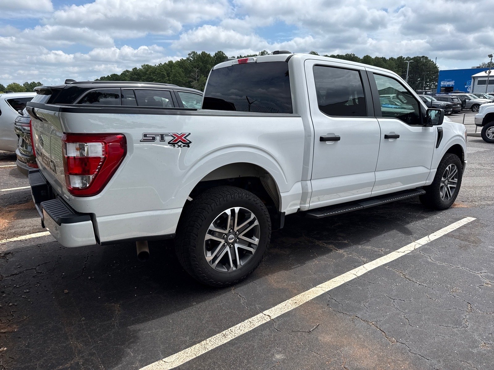 Used 2021 Oxford White Ford 4x4 XL 4dr SuperCrew 5.5 ft. SB image 2