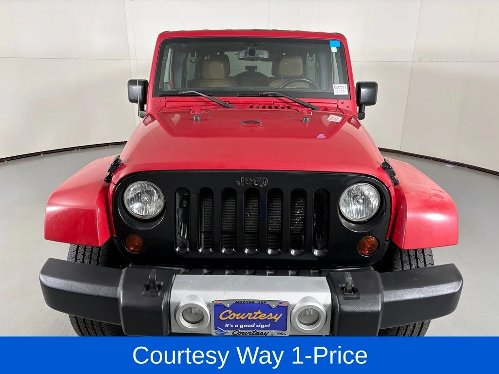 Used 2013 Red Jeep Unlimited Sahara image 5