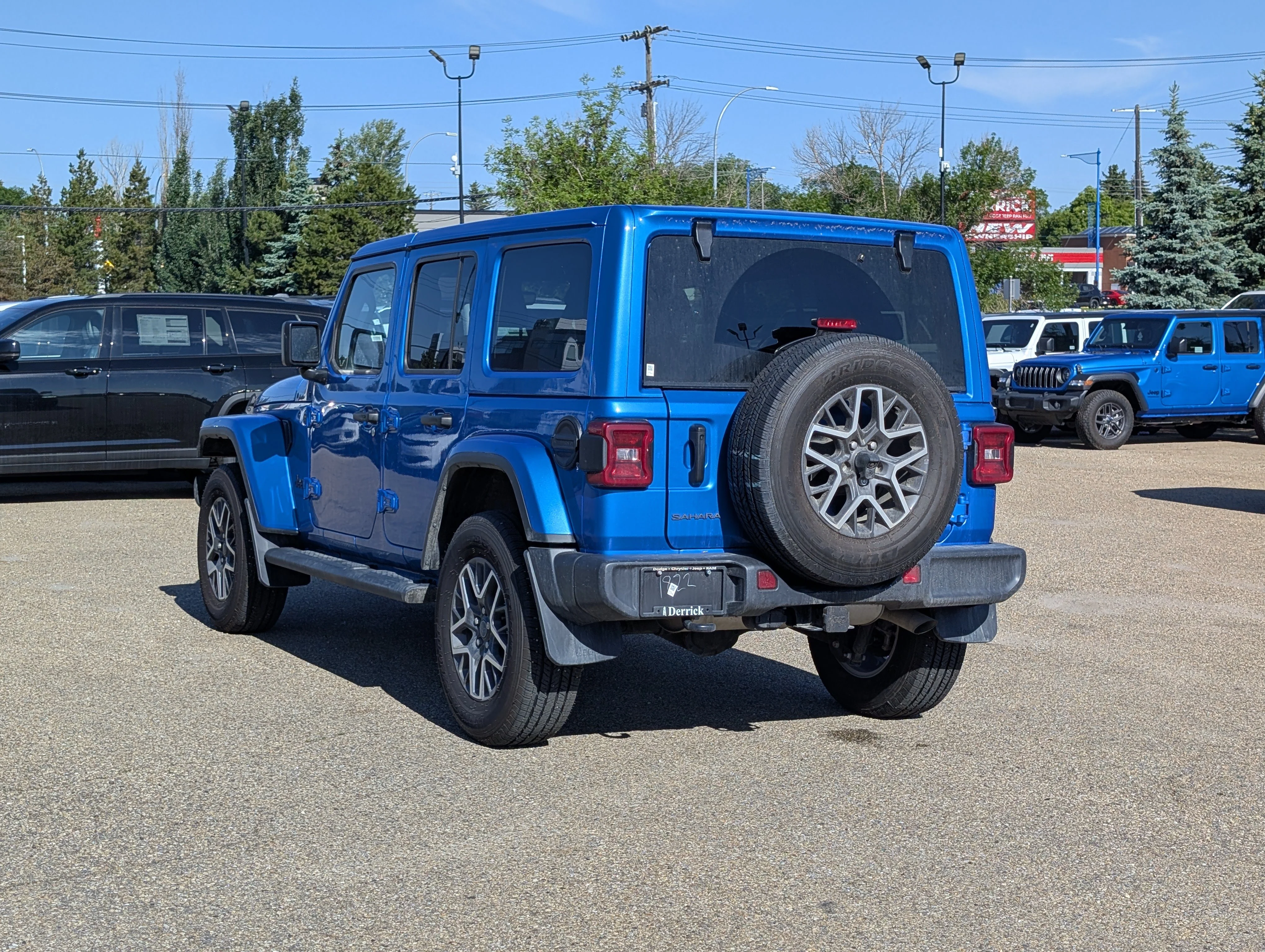 New 2025 Hydro Blue Pearl Jeep Sahara image 4