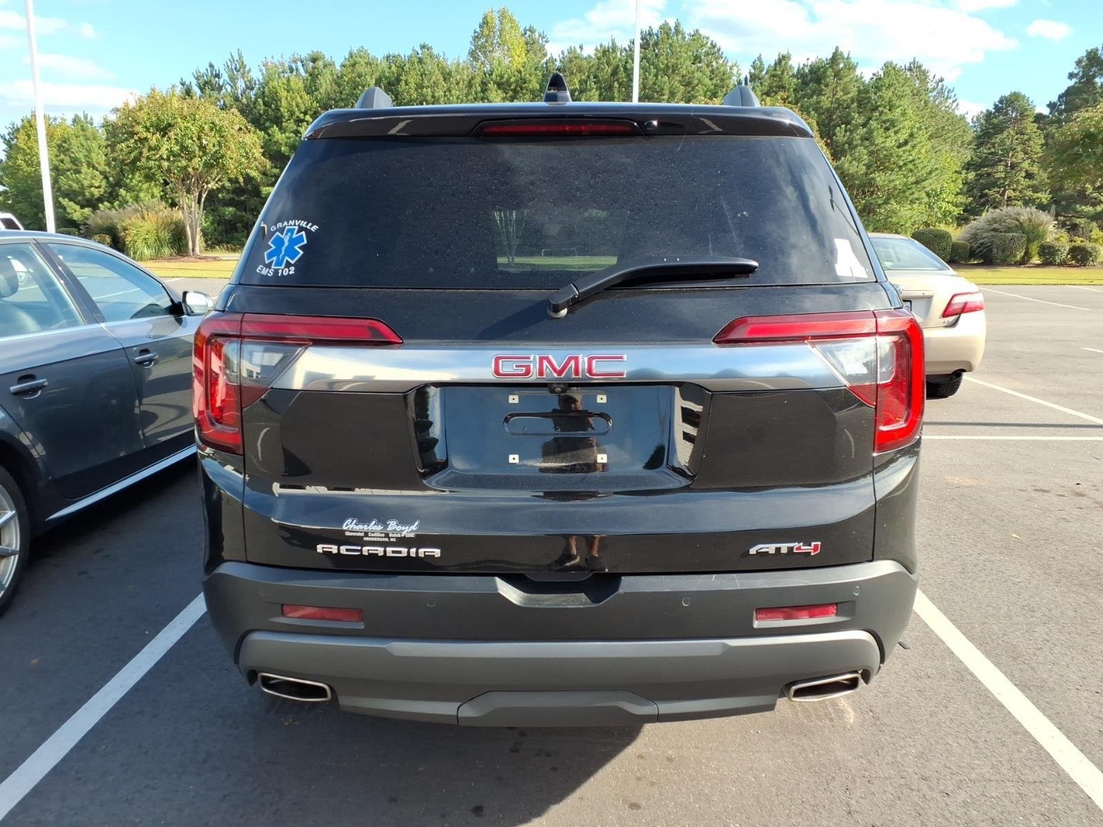 Used 2023 Ebony Twilight Metallic GMC AT4 image 4