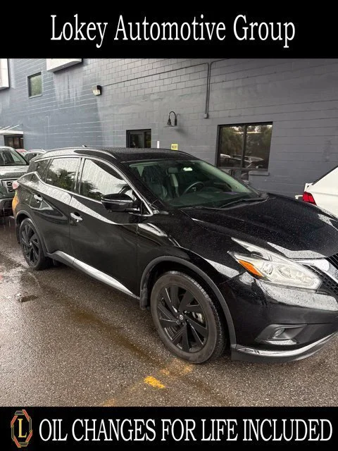 Used 2017 Black Nissan Platinum image 1