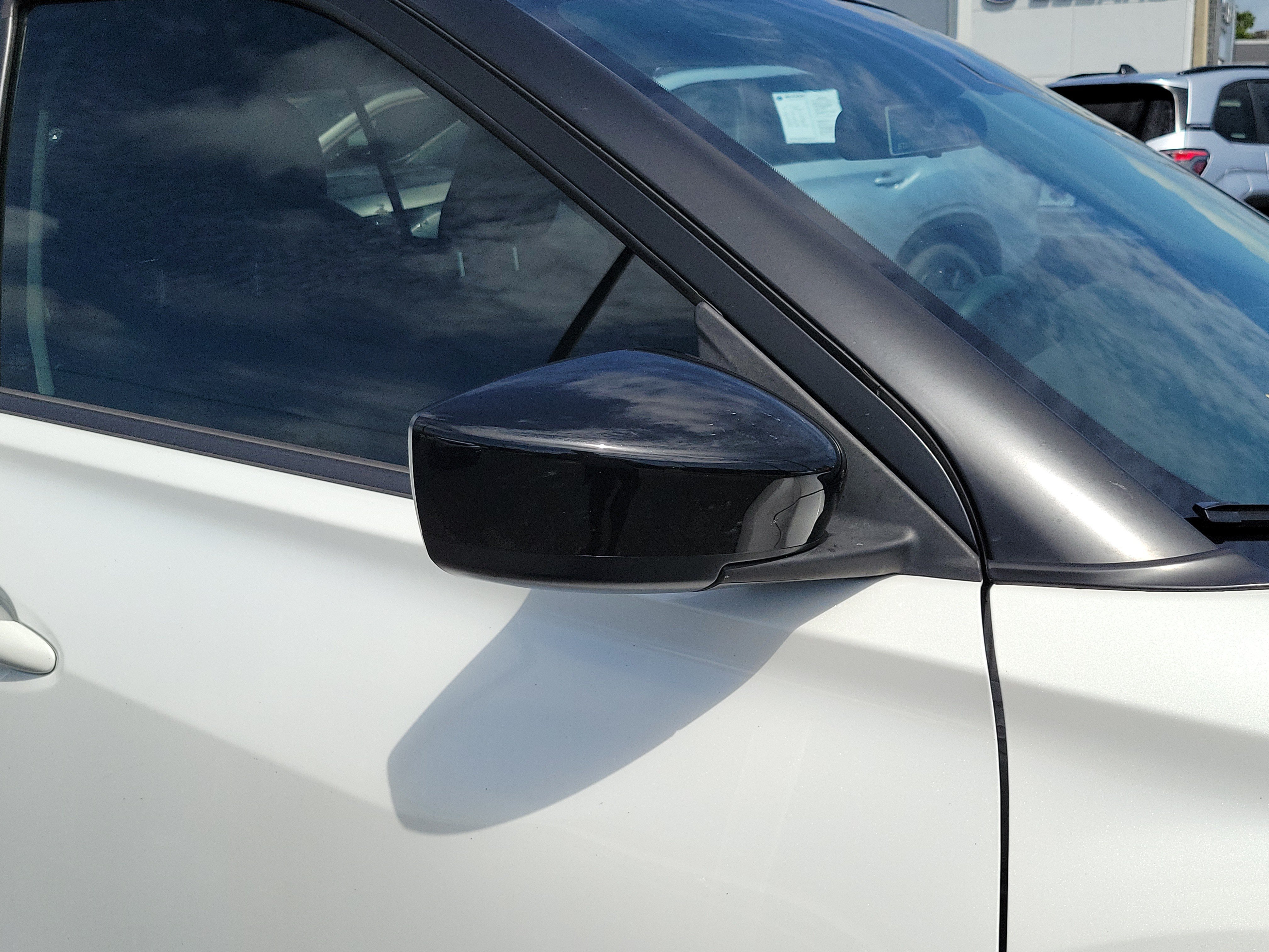 Used 2024 Aspen White Tricoat/Super Black Nissan SV image 8