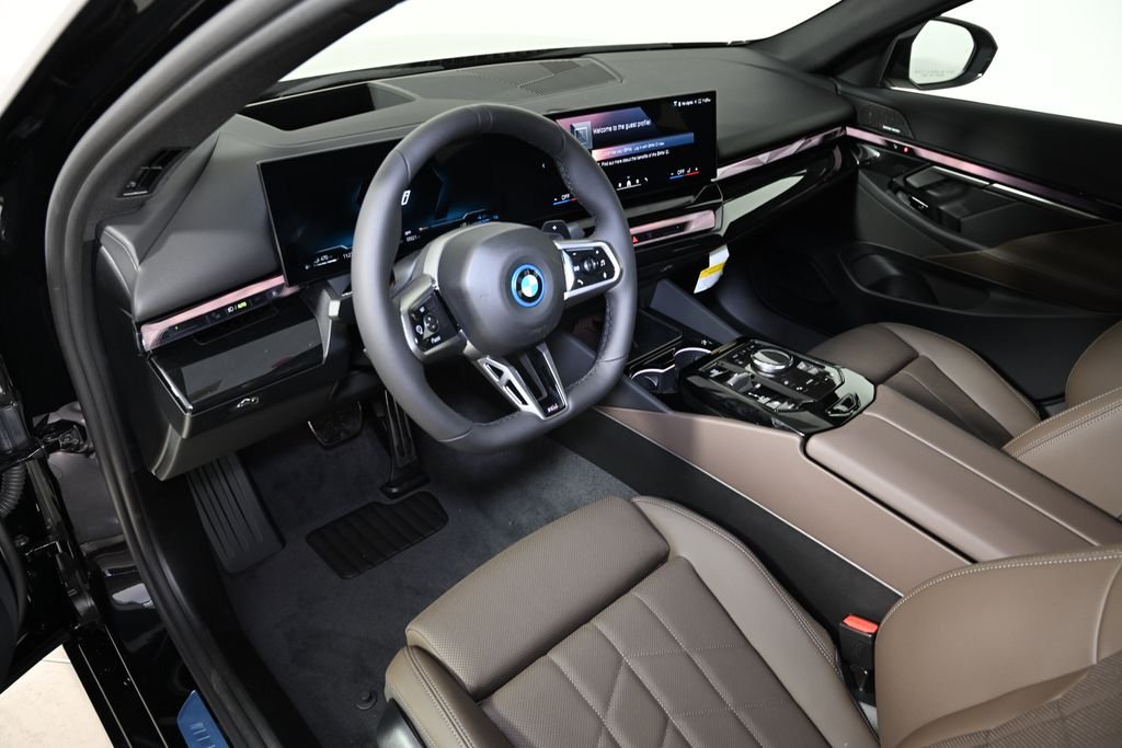 New 2027 Black Sapphire Metallic BMW 550e xDrive image 15