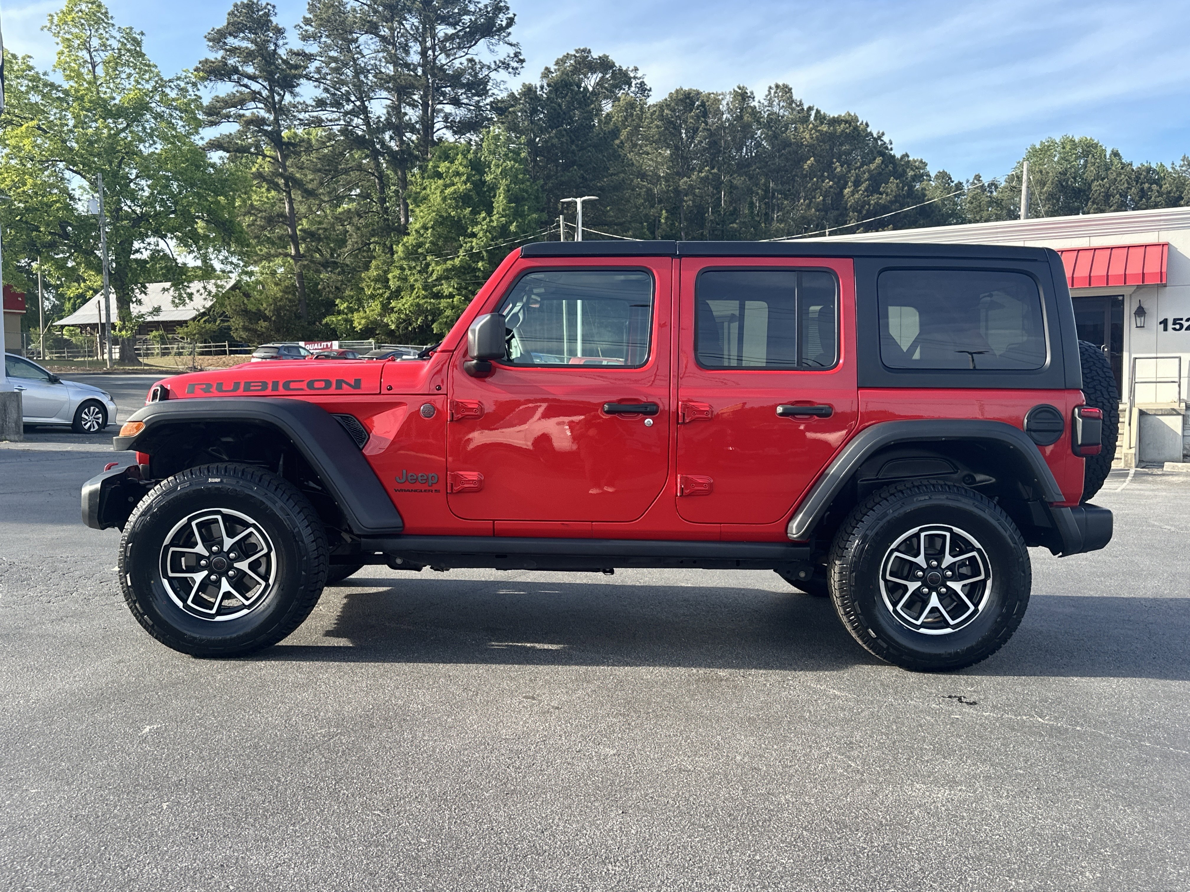 Used 2024 Firecracker Red Clearcoat Jeep Rubicon image 5