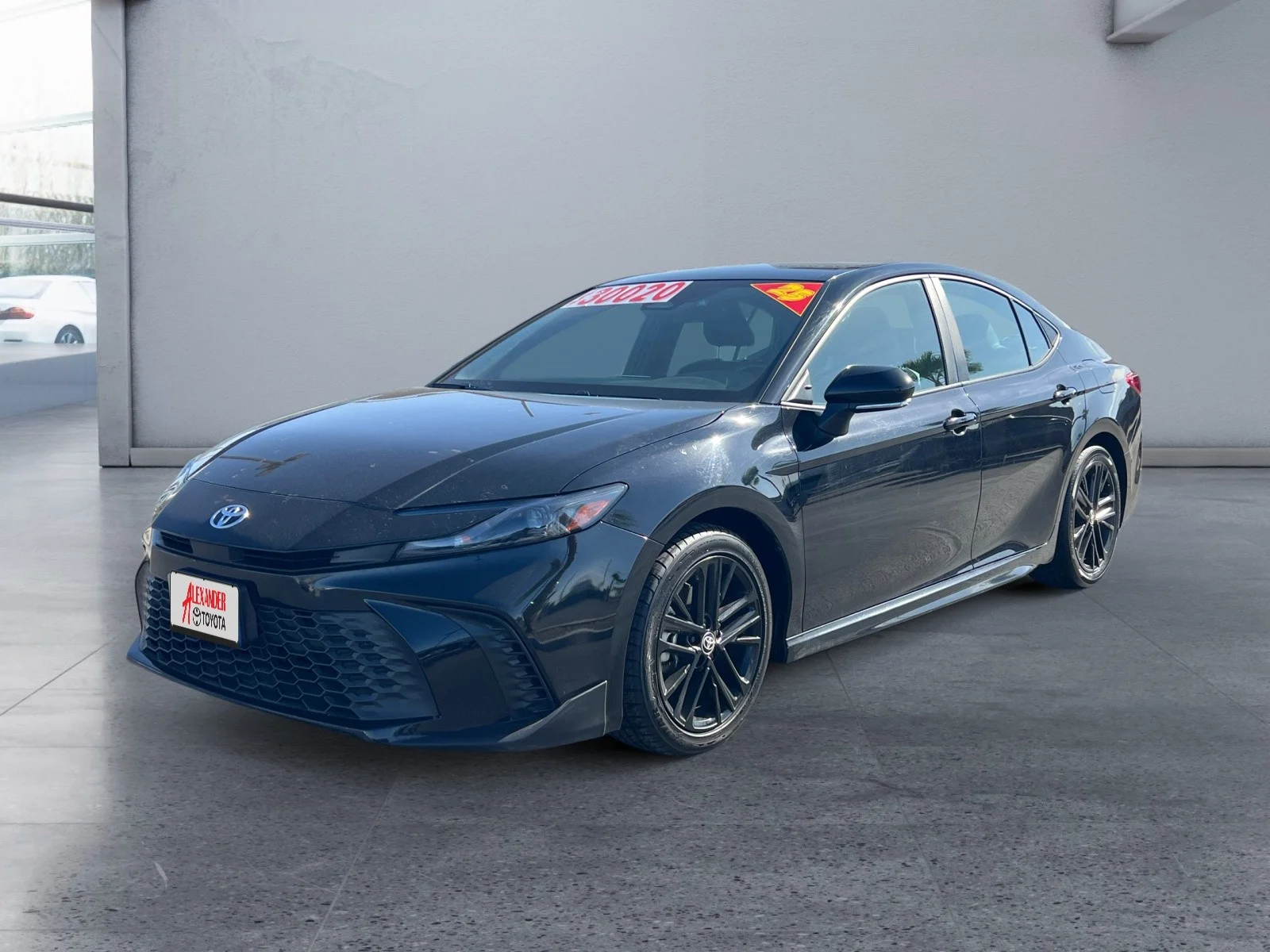 Used 2025 Midnight Black Metallic Toyota SE image 1