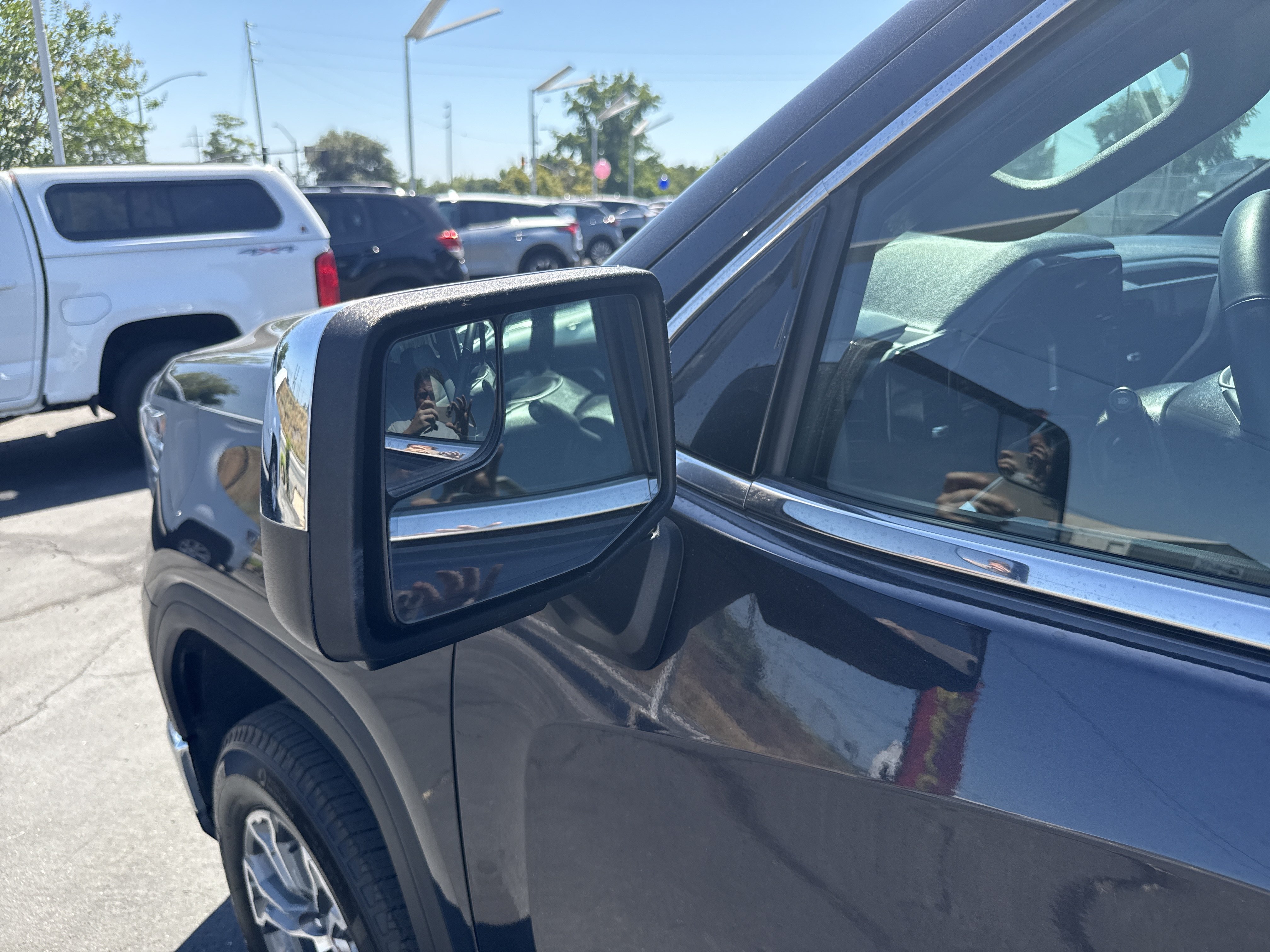Used 2025 Titanium Rush Metallic GMC SLT image 11