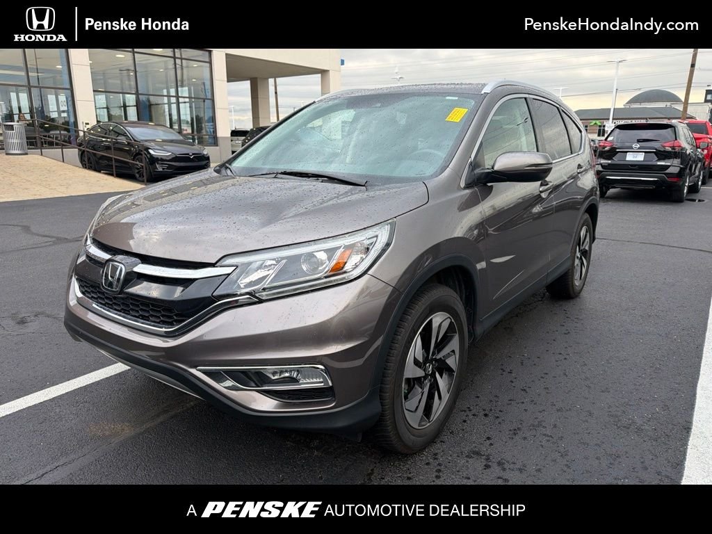 Used 2016 Urban Titanium Metallic Honda Touring image 1