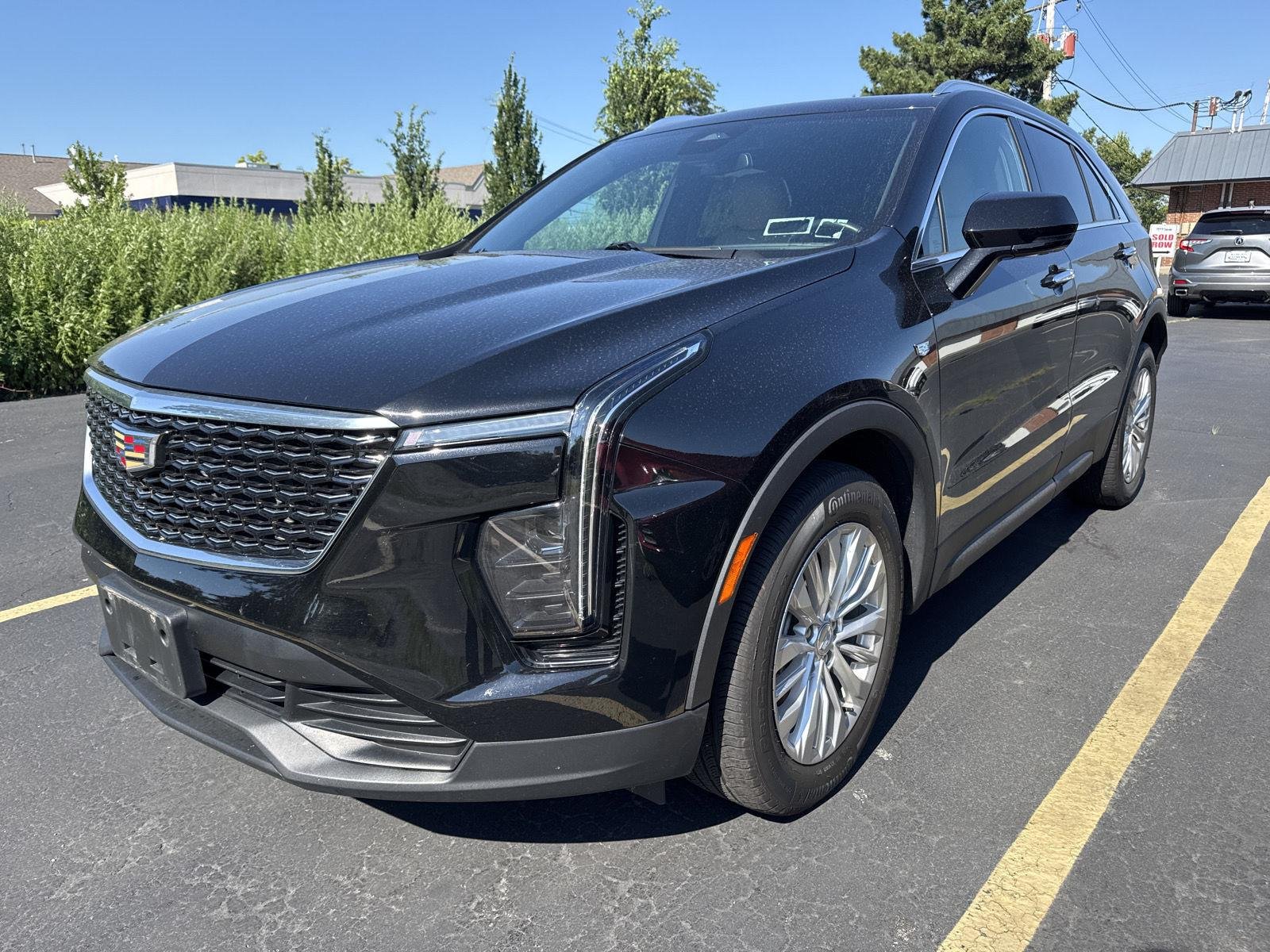 Used 2024 Stellar Black Metallic Cadillac AWD Luxury image 3