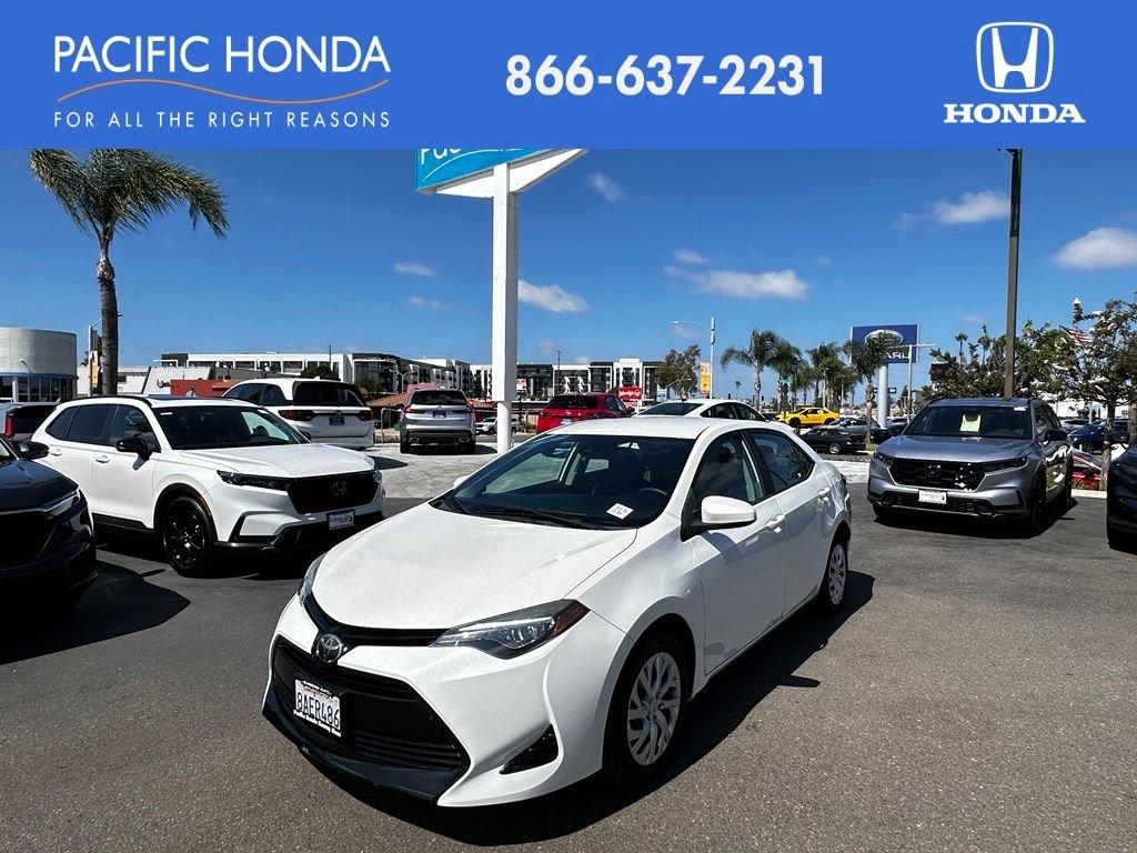 Used 2017 White Toyota LE image 1