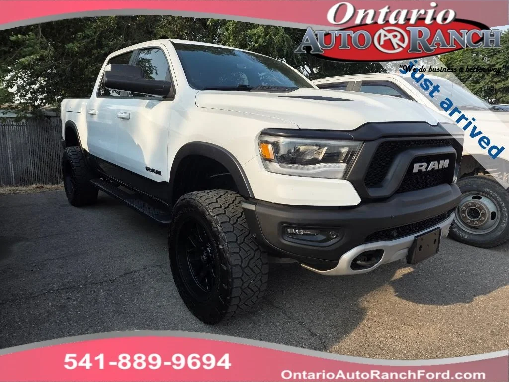 Used 2019 Bright White Ram Rebel image 1