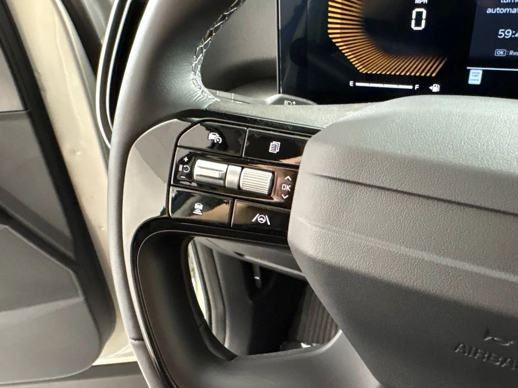 New 2026 Ivory Silver Kia LX image 30