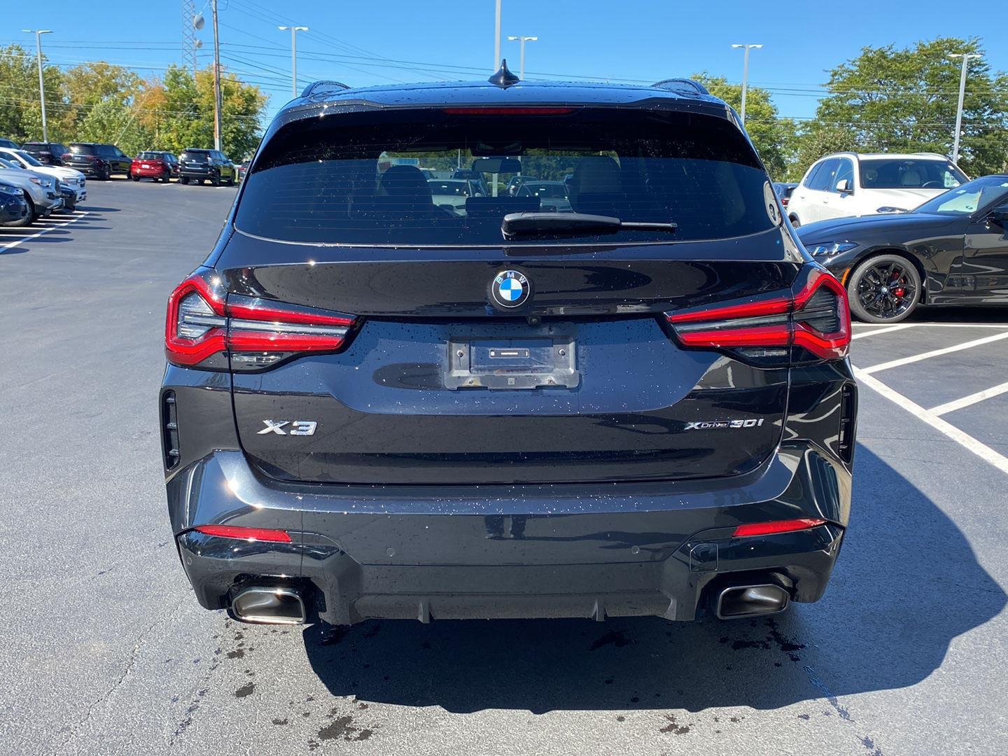 Used 2024 Black Sapphire Metallic BMW xDrive30i image 4