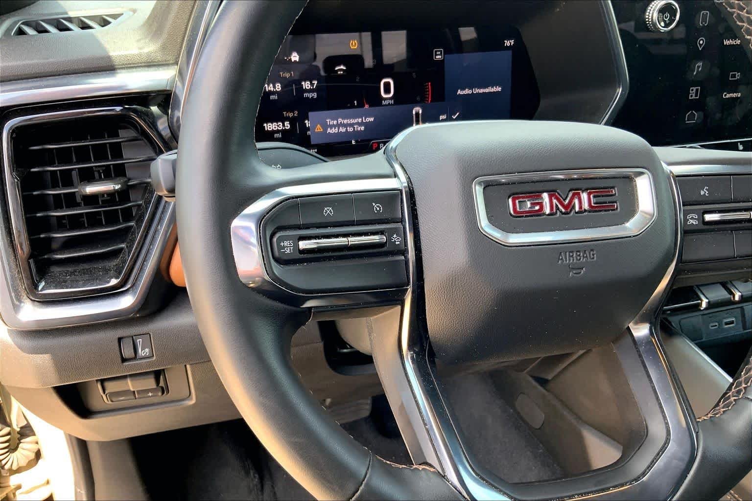 Used 2024 Desert Sand Metallic GMC 4WD AT4 image 23