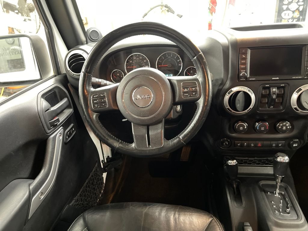 Used 2014 White Jeep Unlimited Sahara image 17