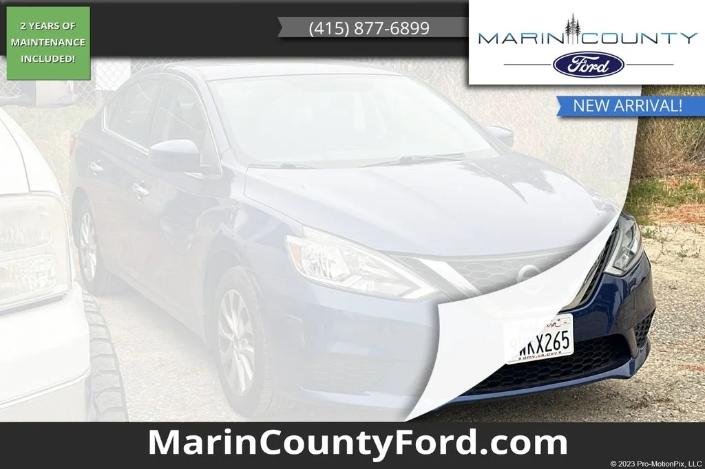 Used 2016 Deep Blue Pearl Nissan SV image 1