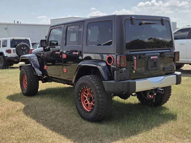 Used 2014 Black Jeep Unlimited Sahara image 7