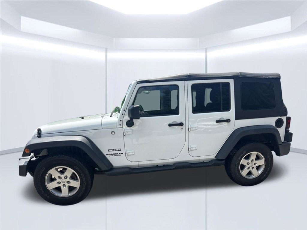 Used 2015 White Jeep Unlimited Sport image 4