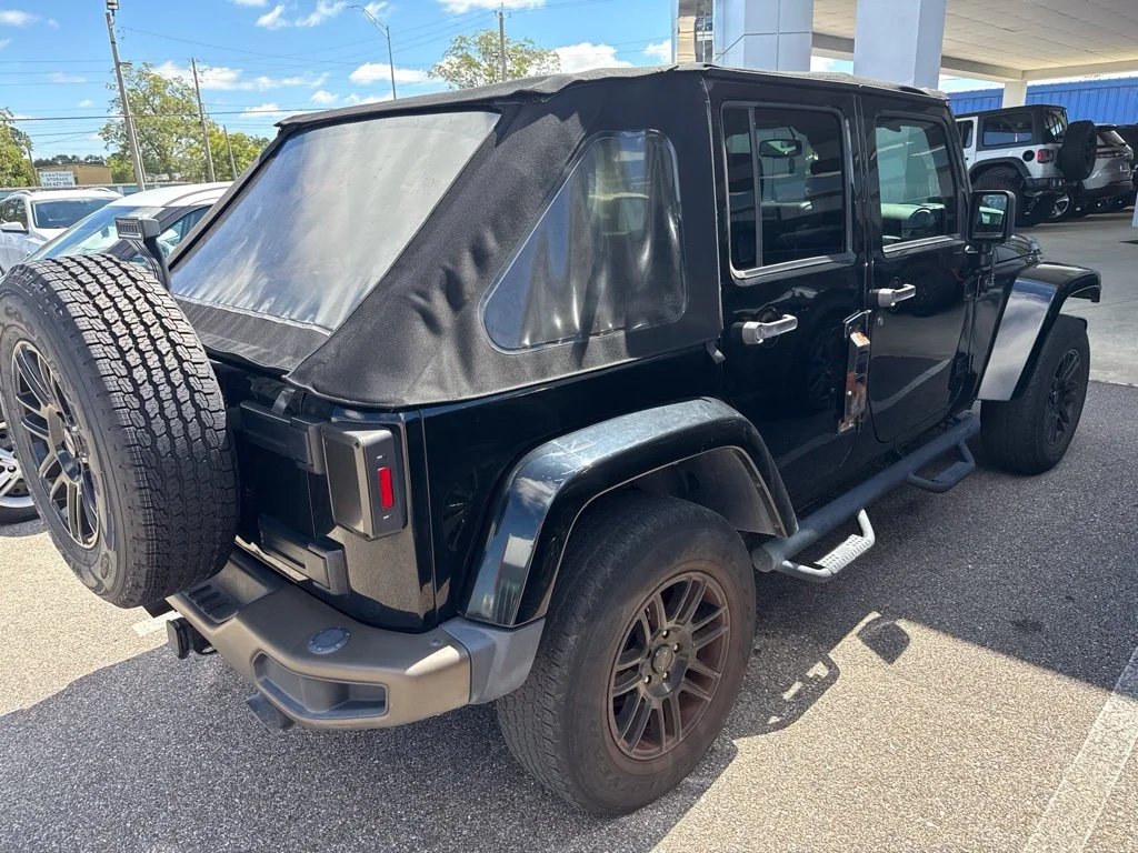 Used 2017 Black Jeep Unlimited Sahara image 5