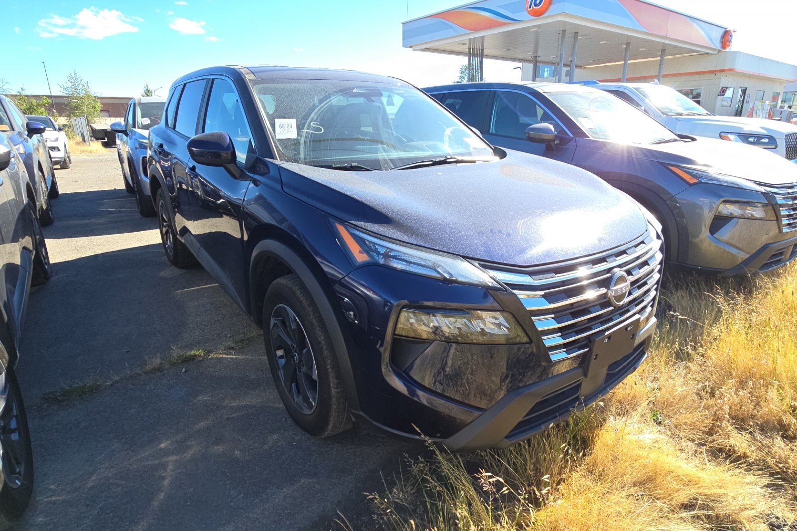 Used 2025 Deep Ocean Blue Pearl Nissan SV image 2