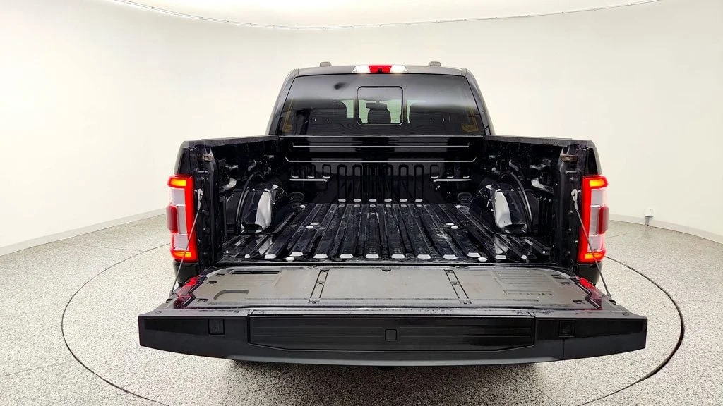 Used 2023 Agate Black Metallic Ford LARIAT 4WD SuperCrew 5.5