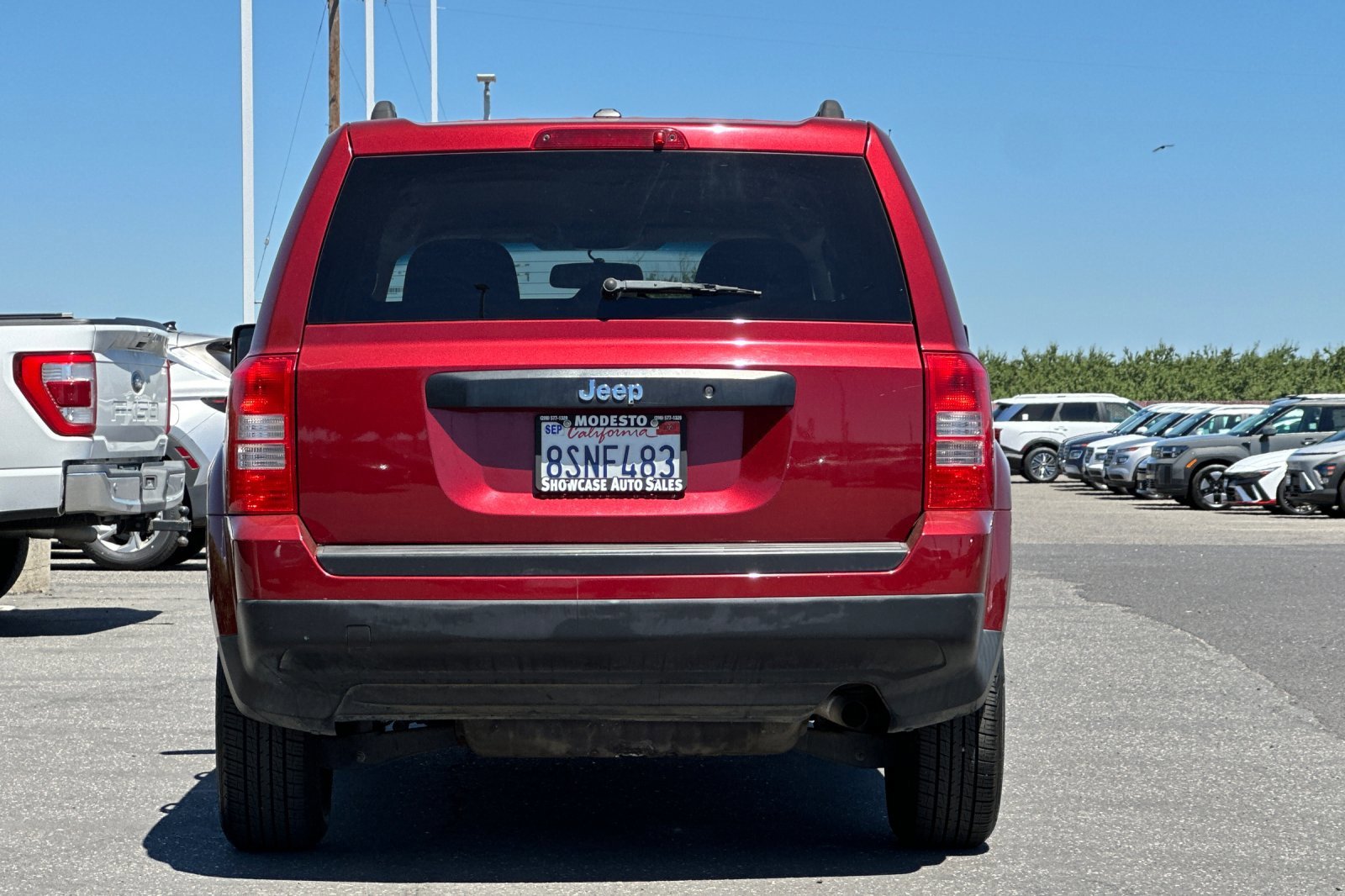 Used 2016 Deep Cherry Red Crystal Pearlcoat Jeep Sport image 5