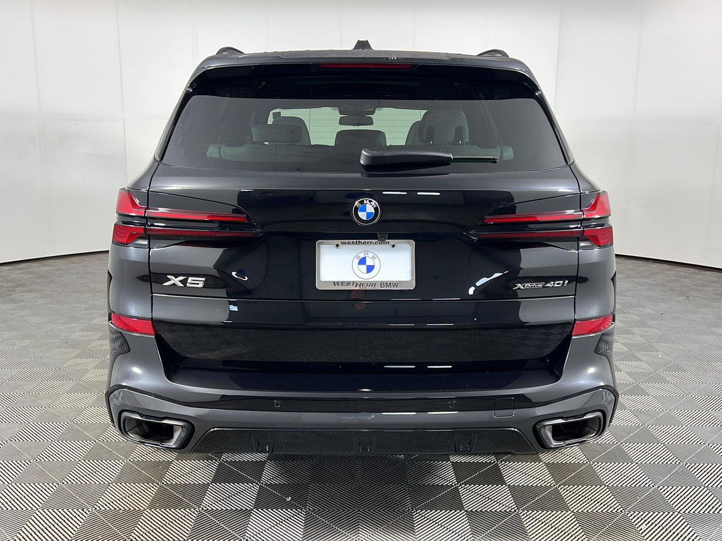 New 2026 Black Sapphire Metallic BMW xDrive40i image 6
