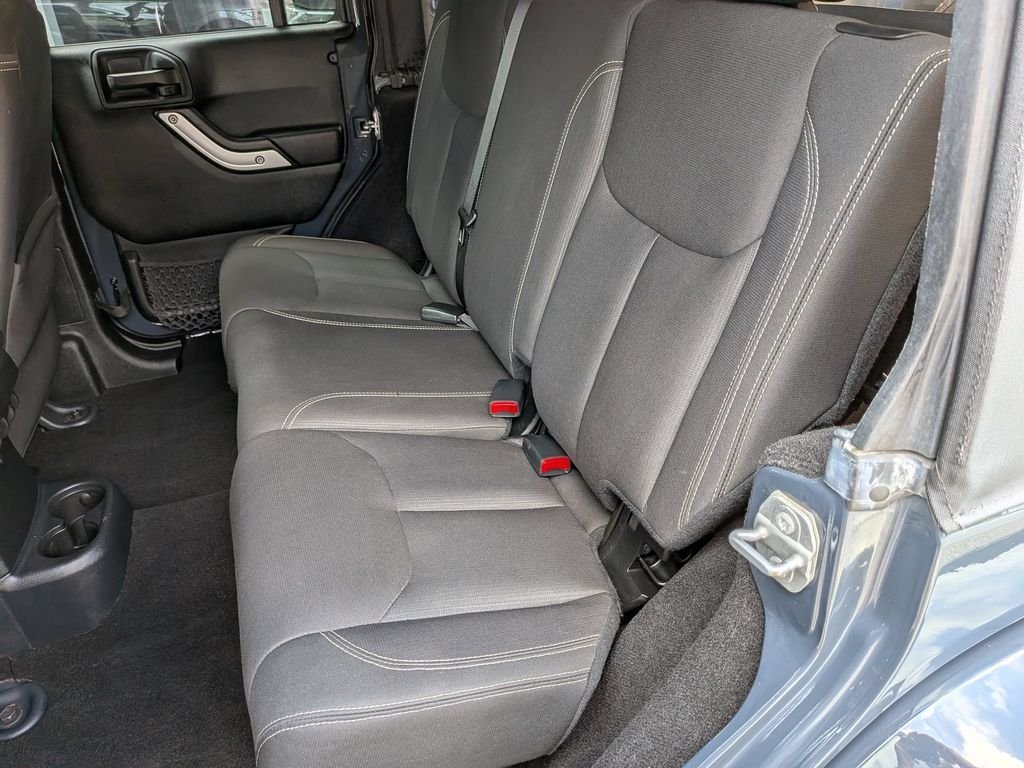 Used 2016 Black Jeep Unlimited Sahara image 19