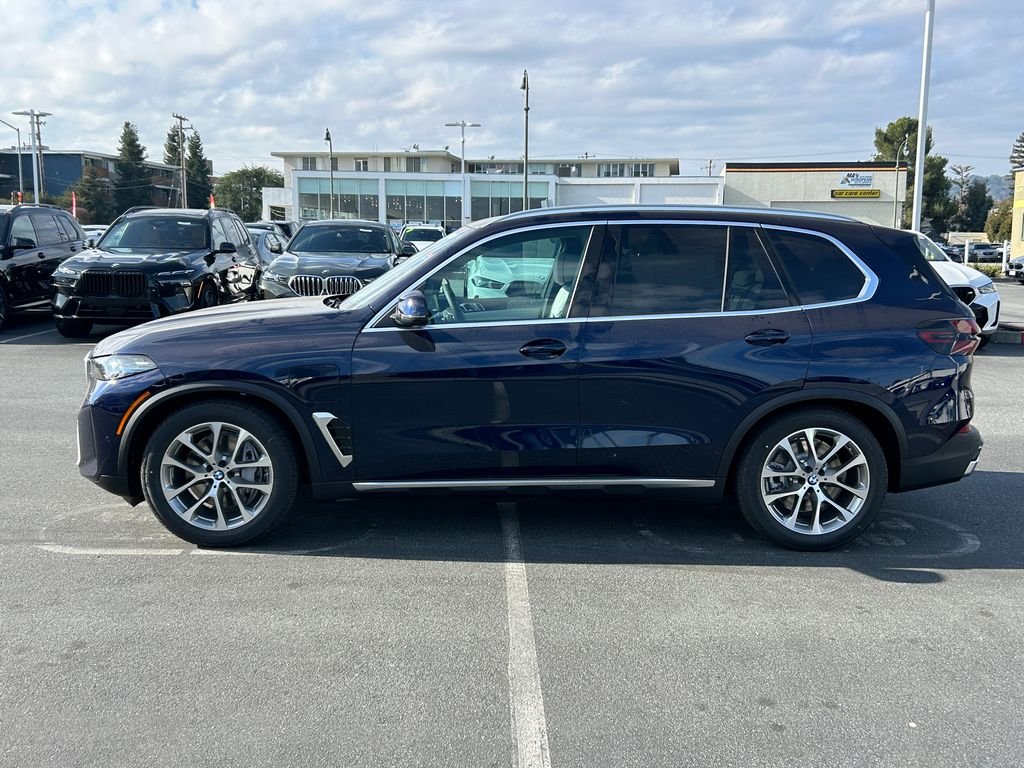 New 2026 Tanzanite Blue II Metallic BMW xDrive50e image 2