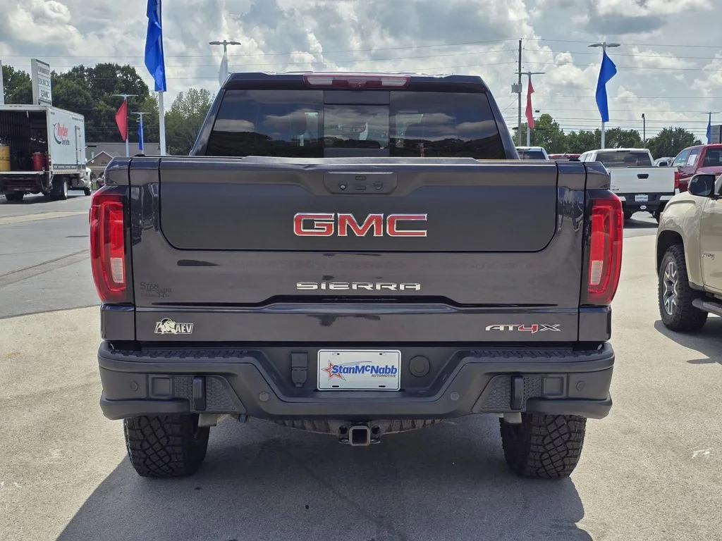 Used 2023 Titanium Rush Metallic GMC AT4X image 6