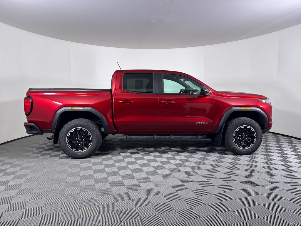 Used 2026 Volcanic Red Tintcoat GMC 4WD AT4 image 11