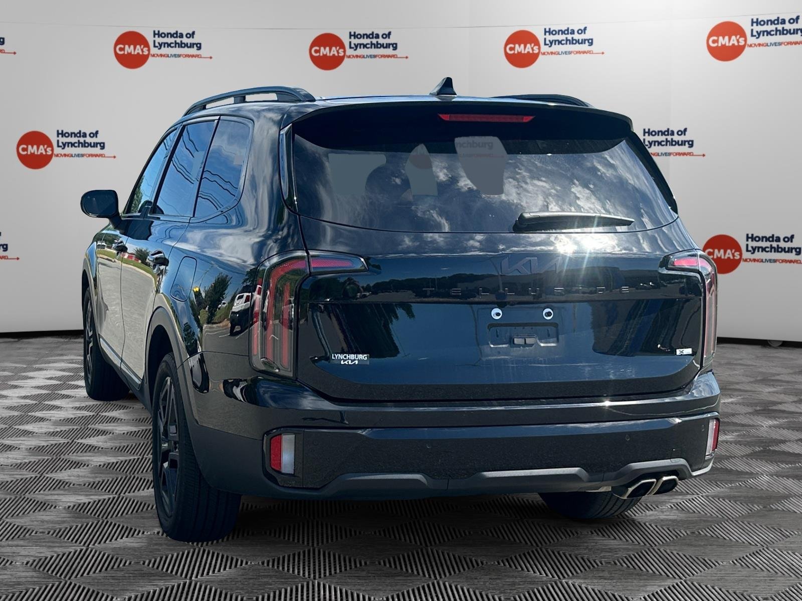 Used 2025 Ebony Black Kia EX X-Line image 3