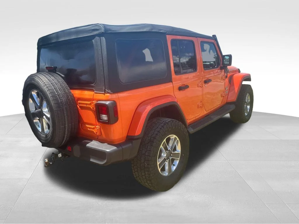 Used 2018 Orange Jeep Unlimited Sahara image 22