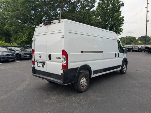Used 2025 Bright White Clearcoat Ram High Roof image 7