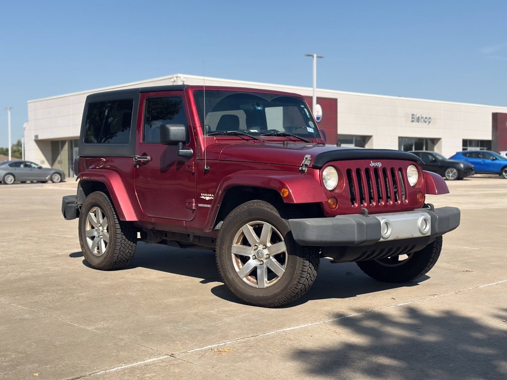 Used 2012 Red Jeep Sahara image 1