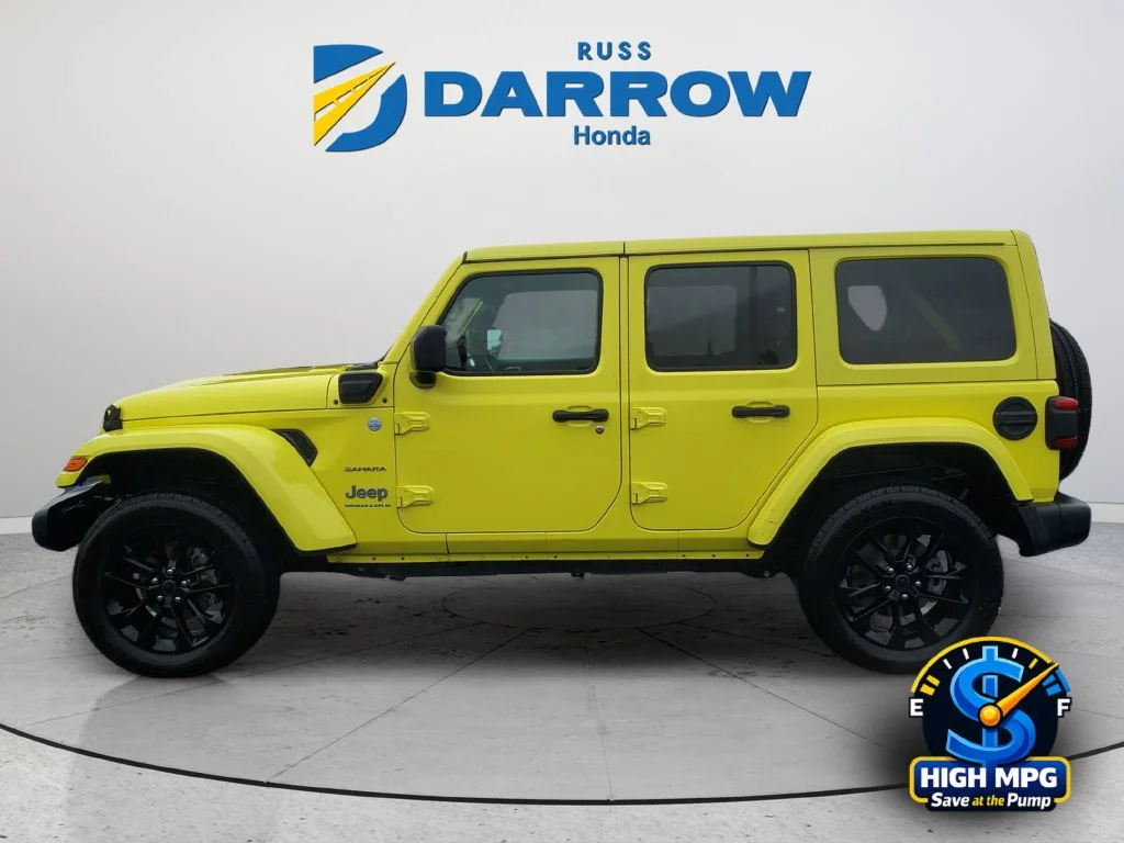 Used 2024 Yellow Jeep Sahara 4xe image 2