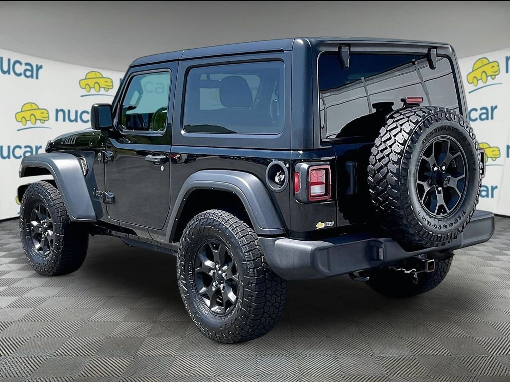 Used 2023 Black Clearcoat Jeep Sport image 4