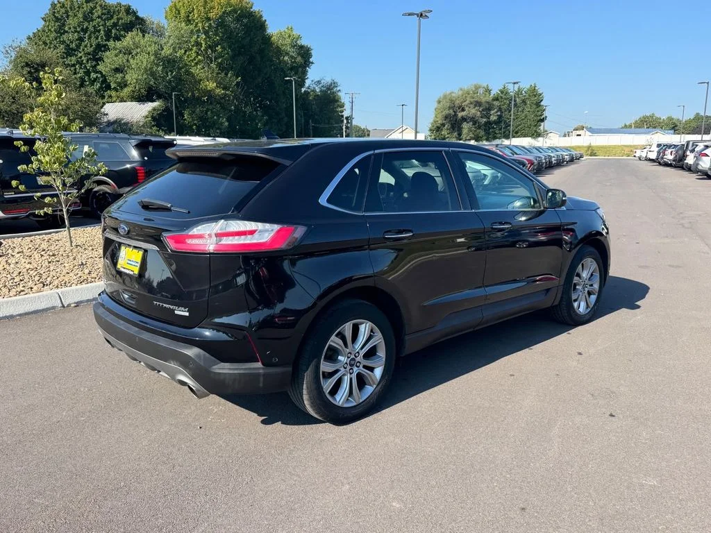 Used 2019 Black Ford Titanium image 4