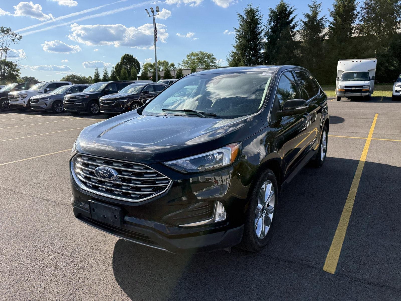 Used 2023 Agate Black Ford Titanium image 2