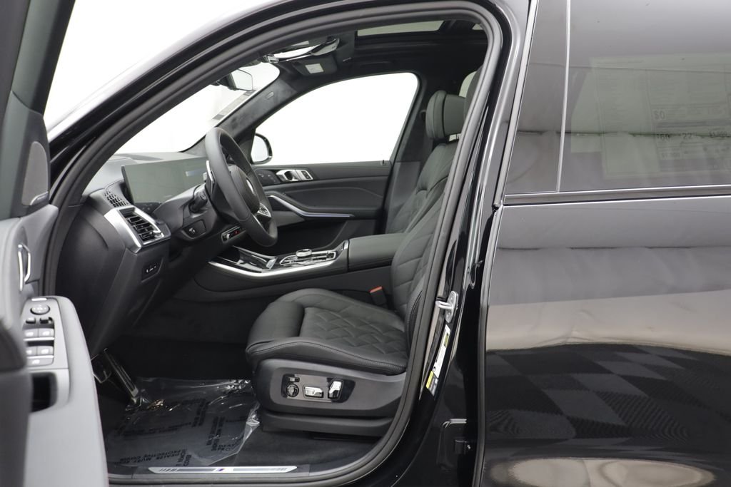 New 2026 Black Sapphire Metallic BMW xDrive50e image 4